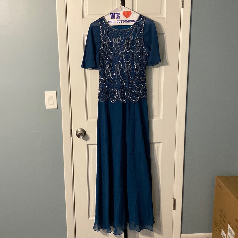 Peacock blue dress worn once for a wedding. Sleeves were added. Size 12